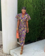 SIMONA | Elegant dress with a V-neck and puff sleeves