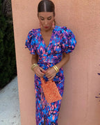 SIMONA | Elegant dress with a V-neck and puff sleeves